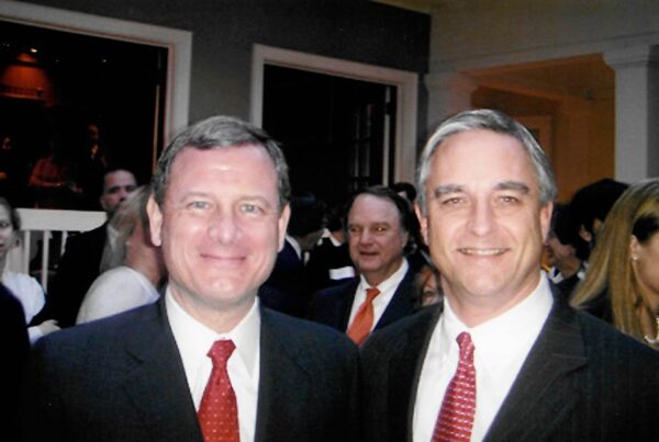 Talmage Boston with U.S. Supreme Court Justice John Roberts